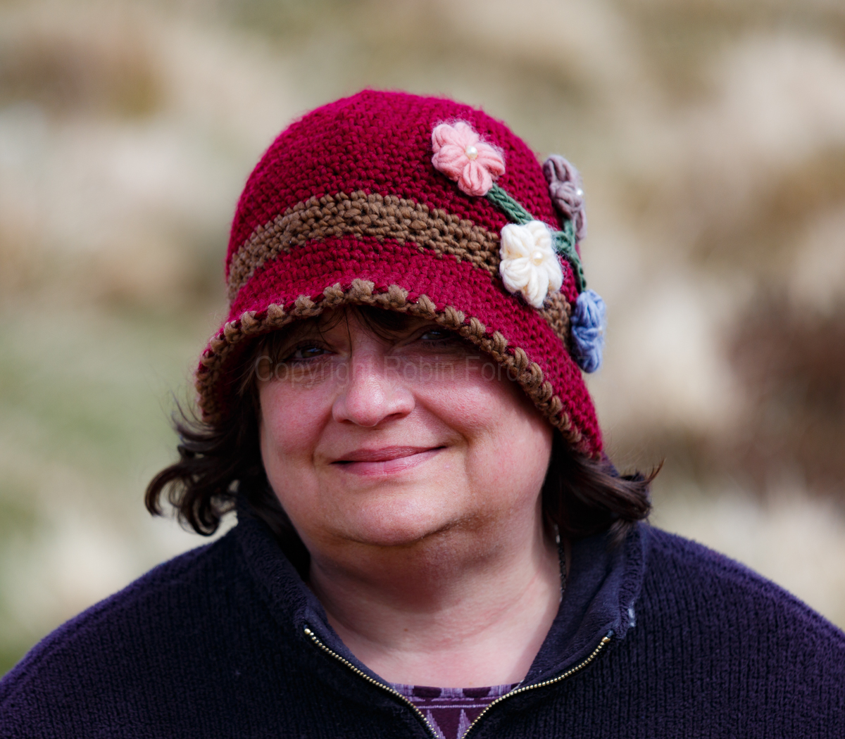 Claire keeping warm at Loch Droma